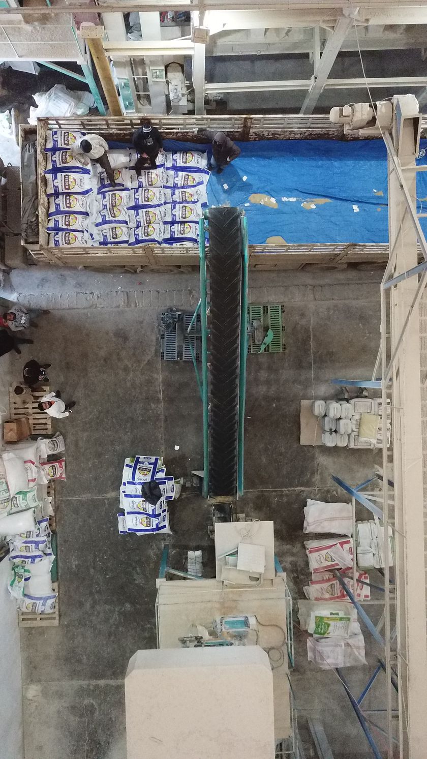 Finished bags going up the conveyor onto the truck
